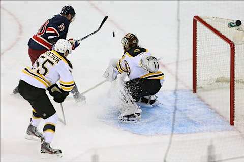 Jan 23 2013; New York, NY, USA; New York Rangers right wing Marian Gaborik (10) scores the game winning goal on Boston Bruins goalie Tuukka Rask (40) in overtime at Madison Square Garden. Rangers won 4-3 in overtime. Mandatory Credit: Anthony Gruppuso-USA TODAY Sports