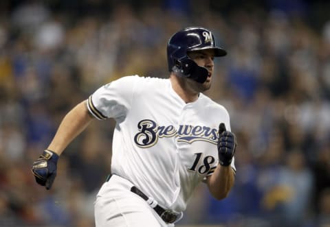 MILWUAKEE, WI – OCTOBER 20: Mike Moustakas #18 of the Milwaukee Brewers singles in the second inning of Game 7 of the NLCS against the Los Angeles Dodgers at Miller Park on Saturday, October, 20, 2018 in Milwaukee, Wisconsin. (Photo by Mike McGinnis/MLB Photos via Getty Images)