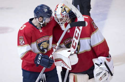 Dec 10, 2016; Sunrise, FL, USA; Florida Panthers defenseman Keith Yandle (left) celebrates with Panthers goalie Roberto Luongo (right) after defeating the Vancouver Canucks 4-2 at BB&T Center. Mandatory Credit: Steve Mitchell-USA TODAY Sports