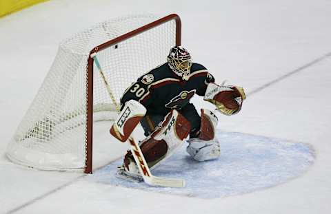 Minnesota Wild goalie Dwayne Roloson competes in the NHL All-Star Super Skills Competition on February 7, 2004 at the Xcel Energy Center in St. Paul, Minnesota. (Robert Laberge/Getty Images)