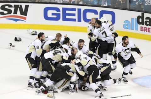 Jun 12, 2016; San Jose, CA, USA; Pittsburgh Penguins players celebrate on the ice after defeating the San Jose Sharks in game six of the 2016 Stanley Cup Final at SAP Center at San Jose. Mandatory Credit: John Hefti-USA TODAY Sports