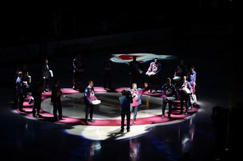 Dec 7, 2015; Denver, CO, USA; Colorado Avalanche alumni and current players are presented before the game against the Minnesota Wild at Pepsi Center. Mandatory Credit: Ron Chenoy-USA TODAY Sports