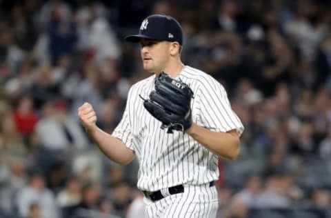 NEW YORK, NY – MAY 09: Jonathan Holder #56 of the New York Yankees reacts to the final out of the eighth inning against the Boston Red Sox at Yankee Stadium on May 9, 2018 in the Bronx borough of New York City. (Photo by Elsa/Getty Images)