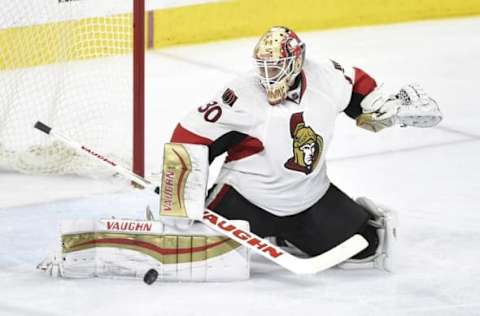 Apr 2, 2016; Philadelphia, PA, USA; Ottawa Senators goalie Andrew Hammond (30) makes a save during the third period against the Philadelphia Flyers at Wells Fargo Center. The Flyers won 3-2. Mandatory Credit: Derik Hamilton-USA TODAY Sports