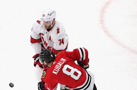 CHICAGO, ILLINOIS – FEBRUARY 04: Dominik Kubalik #8 of the Chicago Blackhawks breaks his stick shooting against Jaccob Slavin #74 of the Carolina Hurricanes at the United Center on February 04, 2021, in Chicago, Illinois. The Blackhawks defeated the Hurricanes 6-4. (Photo by Jonathan Daniel/Getty Images)