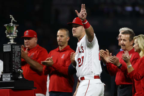 ANAHEIM, CA – SEPTEMBER 28: Mike Trout #27 of the Los Angeles Angels of Anaheim waves to the stadium fans after being named the team’s 2018 MVP during a ceremony prior to the MLB game against the Oakland Athletics at Angel Stadium on September 28, 2018 in Anaheim, California. The Angels defeated the Athletics 8-5. (Photo by Victor Decolongon/Getty Images)