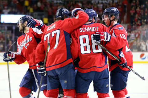 Mar 14, 2017; Washington, DC, USA; Washington Capitals defenseman Nate Schmidt (88) celebrates with teammates after scoring a goal against the Minnesota Wild in the first period at Verizon Center. Mandatory Credit: Geoff Burke-USA TODAY Sports