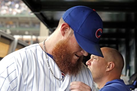 Craig Kimbrel heads to the clubhouse after giving up back to back home runs during the ninth inning of a game against the St. Louis Cardinals at Wrigley Field on September 21. (Photo by Nuccio DiNuzzo/Getty Images)