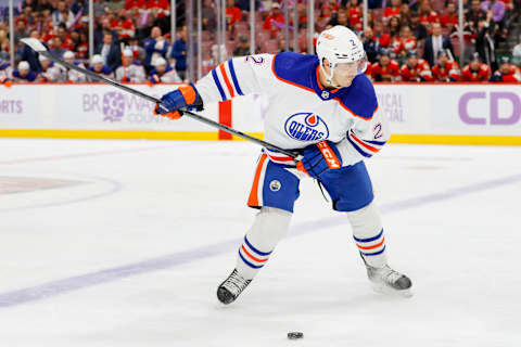 Nov 12, 2022; Sunrise, Florida, USA; Edmonton Oilers defenseman Evan Bouchard (2) shoots the puck during the first period against the Florida Panthers at FLA Live Arena. Mandatory Credit: Sam Navarro-USA TODAY Sports