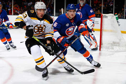 UNIONDALE, NY – MARCH 19: Ryan Pulock #6 of the New York Islanders skates against Brad Marchand #63 of the Boston Bruins NYCB Live’s Nassau Coliseum on March 19, 2019 in Uniondale, New York. Boston Bruins defeated the New York Islanders 5-0. (Photo by Mike Stobe/NHLI via Getty Images)