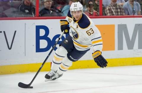 Sep 26, 2015; Ottawa, Ontario, CAN; Buffalo Sabres center Tyler Ennis (63) skates with the puck in the first period against the Ottawa Senators at Canadian Tire Centre. Mandatory Credit: Marc DesRosiers-USA TODAY Sports