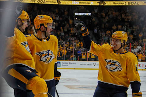 NASHVILLE, TENNESSEE – OCTOBER 10: Filip Forsberg #9 of the Nashville Predators  and Mikael Granlund #64  (Photo by Frederick Breedon/Getty Images)