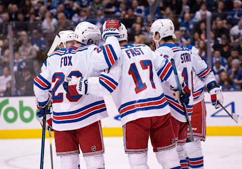 TORONTO, ON – DECEMBER 28: New York Rangers center Ryan Strome (16) celebrates scoring a goal with New York Rangers right wing Jesper Fast (17) during the second period in a game between the New York Rangers and the Toronto Maple Leafs on December 28, 2019, at Scotiabank Arena in Toronto, Ontario Canada.(Photo by Nick Turchiaro/Icon Sportswire via Getty Images)