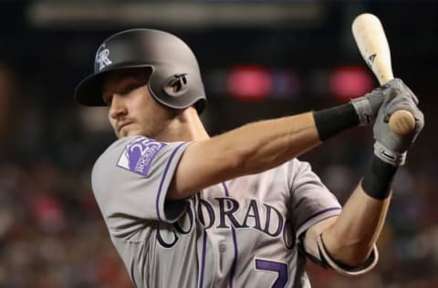 PHOENIX, AZ – JULY 21: Garrett Hampson #7 of the Colorado Rockies warms up on deck during the third inning of the MLB game against the Arizona Diamondbacks at Chase Field on July 21, 2018 in Phoenix, Arizona. (Photo by Christian Petersen/Getty Images)