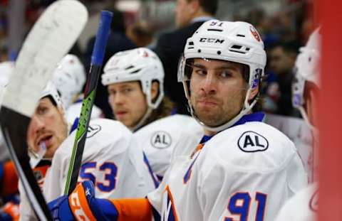 Mar 26, 2016; Raleigh, NC, USA; New York Islanders forward John Tavares (91) looks on from the bench against the Carolina Hurricanes at PNC Arena. The New York Islanders defeated the Carolina Hurricanes 4-3 in the overtime. Mandatory Credit: James Guillory-USA TODAY Sports