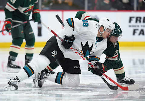 MINNEAPOLIS, MN – FEBRUARY 25: San Jose Sharks Left Wing Tomas Hertl (48) and Minnesota Wild Center Mikko Koivu (9) face-off during a NHL game between the Minnesota Wild and San Jose Sharks on February 25, 2018 at Xcel Energy Center in St. Paul, MN. The Wild defeated the Sharks 3-2 in overtime.(Photo by Nick Wosika/Icon Sportswire via Getty Images)