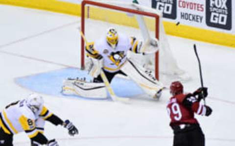 NHL Trade Rumors: Arizona Coyotes left wing Brendan Perlini (29) shoots the puck as Pittsburgh Penguins goalie Marc-Andre Fleury (29) defends during the third period at Gila River Arena. Mandatory Credit: Matt Kartozian-USA TODAY Sports