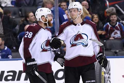 TORONTO, ON – JANUARY 14: Colorado Avalanche Center Carl Soderberg (34) celebrates after scoring a hat trick into the empty net with Colorado Avalanche Defenceman Ian Cole (28) during the third period of the NHL regular season game between the Colorado Avalanche and the Toronto Maple Leafs on January 14, 2019, at Scotiabank Arena in Toronto, ON, Canada. (Photo by Julian Avram/Icon Sportswire via Getty Images)