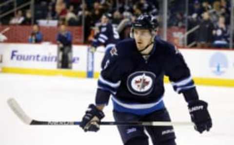 Jan 26, 2016; Winnipeg, Manitoba, CAN; Winnipeg Jets center Mark Scheifele (55) warms up prior to the game against the Arizona Coyotes at MTS Centre. Mandatory Credit: Bruce Fedyck-USA TODAY Sports