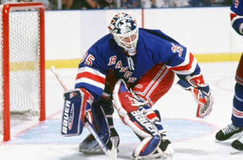 BOSTON, MA. – 1990’s: Mike Richter #35 of the New York Rangers defends goal against the Boston Bruins at Boston Garden. (Photo by Steve Babineau/NHLI via Getty Images)