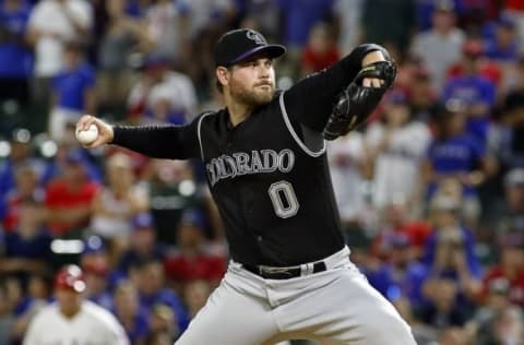 Aug 10, 2016; Arlington, TX, USA; Colorado Rockies relief pitcher Adam Ottavino (0) throws in the eighth inning against the Texas Rangers at Globe Life Park in Arlington. Rangers won 5-4. Mandatory Credit: Ray Carlin-USA TODAY Sports