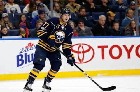 Feb 9, 2017; Buffalo, NY, USA; Buffalo Sabres defenseman Dmitry Kulikov (77) against the Anaheim Ducks at KeyBank Center. Anaheim beats Buffalo 5 to 2. Mandatory Credit: Timothy T. Ludwig-USA TODAY Sports