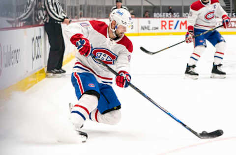 VANCOUVER, BC – JANUARY 20: Tomas Tatar #90 of the Montreal Canadiens stops while skating with the puck during NHL hockey action against the Vancouver Canucks at Rogers Arena on January 20, 2021, in Vancouver, Canada. (Photo by Rich Lam/Getty Images)