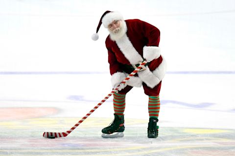 CHICAGO, IL – DECEMBER 23: Santa Clause shoots the puck before the start of the third period of a game between the Colorado Avalanche and the Chicago Blackhawks on December 23, 2016, at the United Center in Chicago, IL. (Photo by Robin Alam/Icon Sportswire via Getty Images)