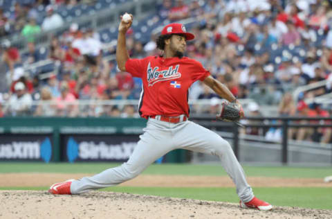 WASHINGTON, DC – JULY 15: Adonis Medina of the World Team pitches in the seventh inning against the U.S. Team during the SiriusXM All-Star Futures Game at Nationals Park on July 15, 2018 in Washington, DC. (Photo by Rob Carr/Getty Images)