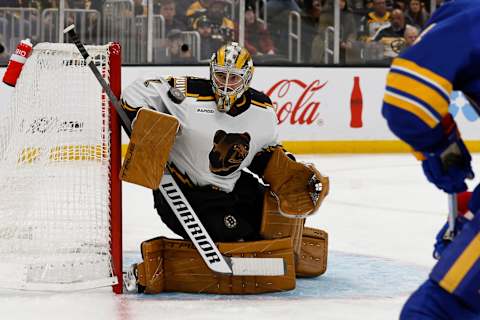 Dec 31, 2022; Boston, Massachusetts, USA; Boston Bruins goaltender Jeremy Swayman (1) stops a Buffalo Sabres shot during the second period at TD Garden. Mandatory Credit: Winslow Townson-USA TODAY Sports