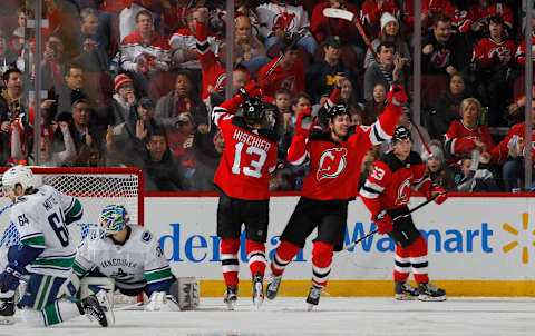 Nico Hischier #13 and Jesper Bratt #63 of the New Jersey Devils. (Photo by Jim McIsaac/Getty Images)