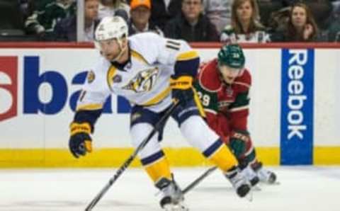 Nov 5, 2015; Saint Paul, MN, USA; Nashville Predators forward Cody Hodgson (11) carries the puck past Minnesota Wild forward Jason Pominville (29) during the third period at Xcel Energy Center. The Predators defeated the Wild 3-2. Mandatory Credit: Brace Hemmelgarn-USA TODAY Sports