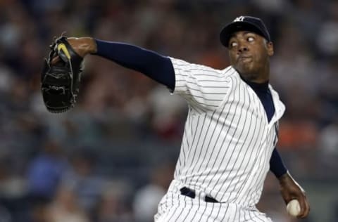 Jul 22, 2016; Bronx, NY, USA; New York Yankees relief pitcher Aroldis Chapman (54) pitches during the ninth inning of an inter-league baseball game against the San Francisco Giants at Yankee Stadium. Mandatory Credit: Adam Hunger-USA TODAY Sports