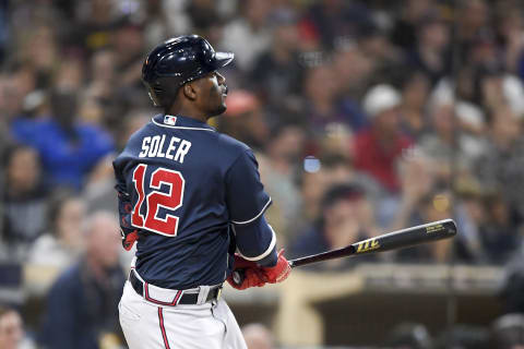 SAN DIEGO, CA – SEPTEMBER 25: Jorge Soler #12 of the Atlanta Braves hits an RBI double during the tenth inning of a baseball game against the San Diego Padres at Petco Park on September 25, 2021 in San Diego, California. (Photo by Denis Poroy/Getty Images)