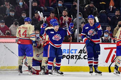 LAVAL, QC – APRIL 08: Linus Weissbach #13 of the Rochester Americans celebrates his goal during the second period against the Laval Rocket at Place Bell on April 8, 2022 in Laval, Canada. (Photo by Minas Panagiotakis/Getty Images)