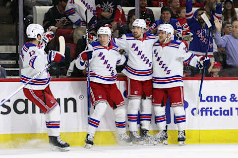 Filip Chytil #72 of the New York Rangers (2nd from right) celebrates his goal against the Carolina Hurricanes (Photo by Bruce Bennett/Getty Images)