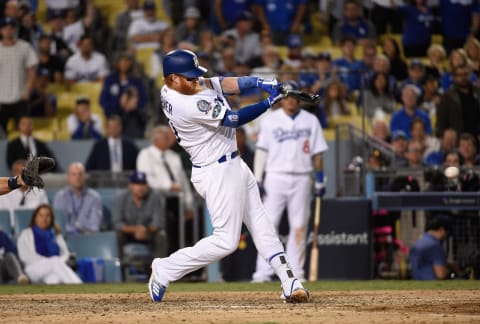 LOS ANGELES, CA – OCTOBER 15: Justin Turner #10 of the Los Angeles Dodgers hits a single to center field during the ninth inning of Game Three of the National League Championship Series against the Milwaukee Brewers at Dodger Stadium on October 15, 2018 in Los Angeles, California. (Photo by Kevork Djansezian/Getty Images)