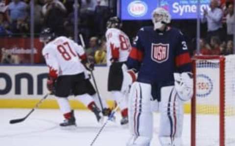 Sep 20, 2016; Toronto, Ontario, Canada; Team USA goaltender Jonathan Quick (32) reacts after a goal by Team Canada forward Patrice Bergeron (37) during the second period of preliminary round play in the 2016 World Cup of Hockey at Air Canada Centre. Mandatory Credit: John E. Sokolowski-USA TODAY Sports