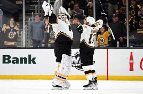 BOSTON, MASSACHUSETTS – NOVEMBER 07: Goaltender Linus Ullmark #35 and Nick Foligno #17 of the Boston Bruins react after the Bruins defeated the St. Louis Blues 3-1 at the TD Garden on November 07, 2022 in Boston, Massachusetts. (Photo by Brian Fluharty/Getty Images)