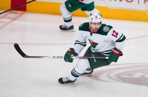 Apr 22, 2016; Dallas, TX, USA; Minnesota Wild right wing David Jones (12) skates against the Dallas Stars in game five of the first round of the 2016 Stanley Cup Playoffs at the American Airlines Center. The Wild defeat the Stars 5-4. Mandatory Credit: Jerome Miron-USA TODAY Sports