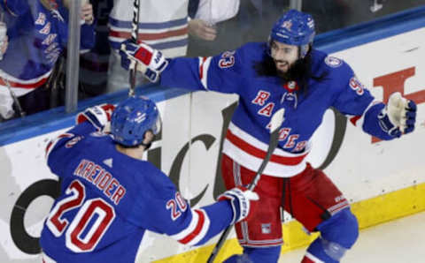 NEW YORK, NEW YORK – JUNE 01: Chris Kreider #20 of the New York Rangers celebrates with his teammate Mika Zibanejad #93 after scoring a goal on Andrei Vasilevskiy #88 of the Tampa Bay Lightning during the first period in Game One of the Eastern Conference Final of the 2022 Stanley Cup Playoffs at Madison Square Garden on June 01, 2022 in New York City. (Photo by Sarah Stier/Getty Images)