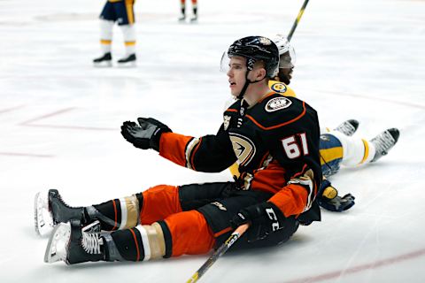 ANAHEIM, CALIFORNIA – MARCH 12: Troy Terry #61 of the Anaheim Ducks and P.K. Subban #76 of the Nashville Predators look toward the officials after a fall during the third period at Honda Center on March 12, 2019 in Anaheim, California. (Photo by Katharine Lotze/Getty Images)