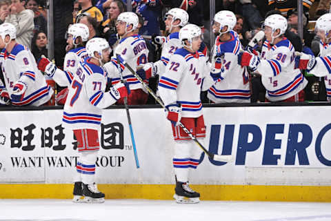 BOSTON, MA – JANUARY 19: New York Rangers Winger Filip Chytil (72) and New York Rangers Defenceman Tony DeAngelo (77) gets congratulations from the bench on their lines goal. During the New York Rangers game against the Boston Bruins on January 19, 2019 at TD Garden in Boston, MA. (Photo by Michael Tureski/Icon Sportswire via Getty Images)