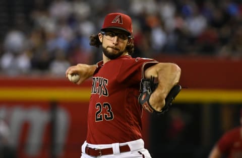 PHOENIX, ARIZONA – SEPTEMBER 04: Zac Gallen #23 of the Arizona Diamondbacks delivers a pitch against the Milwaukee Brewers at Chase Field on September 04, 2022 in Phoenix, Arizona. (Photo by Norm Hall/Getty Images)