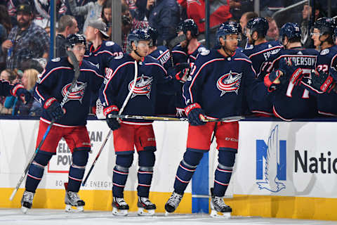 COLUMBUS, OH – OCTOBER 13: Zach Werenski #8, Alexander Wennberg and Seth Jones #3 of the Columbus Blue Jackets high-five their teammates after scoring a goal during the second period of a game against the New York Rangers on October 13, 2017 at Nationwide Arena in Columbus, Ohio. (Photo by Jamie Sabau/NHLI via Getty Images)