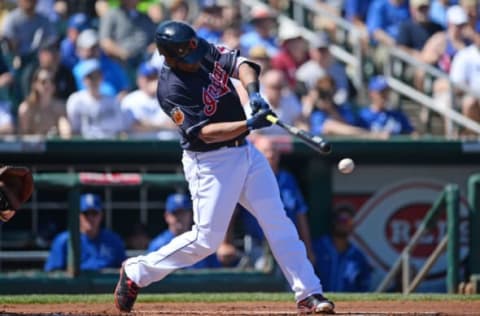 Mar 11, 2017; Goodyear, AZ, USA; Cleveland Indians third baseman Edwin Encarnacion (10) hits a pitch against the Kansas City Royals during the first inning at Goodyear Ballpark. Mandatory Credit: Joe Camporeale-USA TODAY Sports