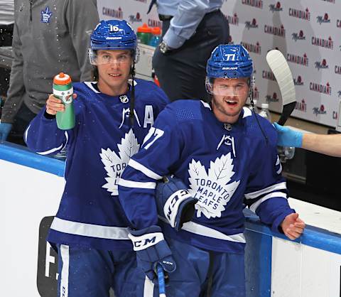 TORONTO, ON – MAY 27: Mitchell Marner #16 and Adam Brooks #77 of the Toronto Maple Leafs warm up prior to action against the Montreal Canadiens in Game Five of the First Round of the 2021 Stanley Cup Playoffs at Scotiabank Arena on May 27, 2021 in Toronto, Ontario, Canada. (Photo by Claus Andersen/Getty Images)