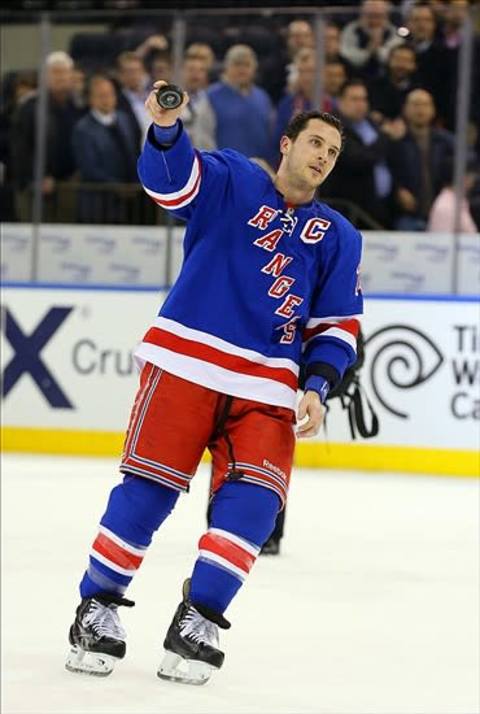 Feb 4, 2014; New York, NY, USA; New York Rangers right wing Ryan Callahan (24) acknowledges the crowd after being names the star of the game against the Colorado Avalanche at Madison Square Garden. The Rangers won 5-1. Mandatory Credit: Adam Hunger-USA TODAY Sports