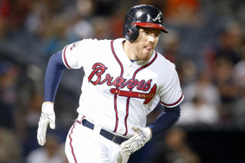 Sep 12, 2016; Atlanta, GA, USA; Atlanta Braves first baseman Freddie Freeman (5) rounds first on a double against the Miami Marlins in the sixth inning at Turner Field. Mandatory Credit: Brett Davis-USA TODAY Sports