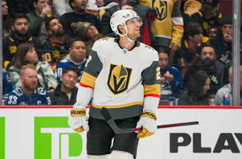 Apr 12, 2022; Vancouver, British Columbia, CAN; Vegas Golden Knights defenseman Shea Theodore (27) celebrates his goal against the Vancouver Canucks in the third period at Rogers Arena. Canucks won 5-4 in overtime. Mandatory Credit: Bob Frid-USA TODAY Sports